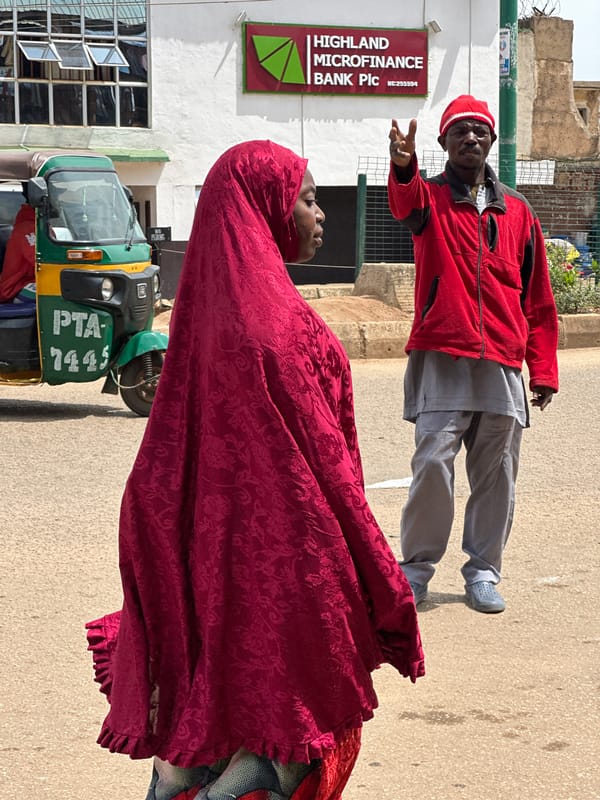 Street commerce and daily movement through Bukuru market, Nigeria