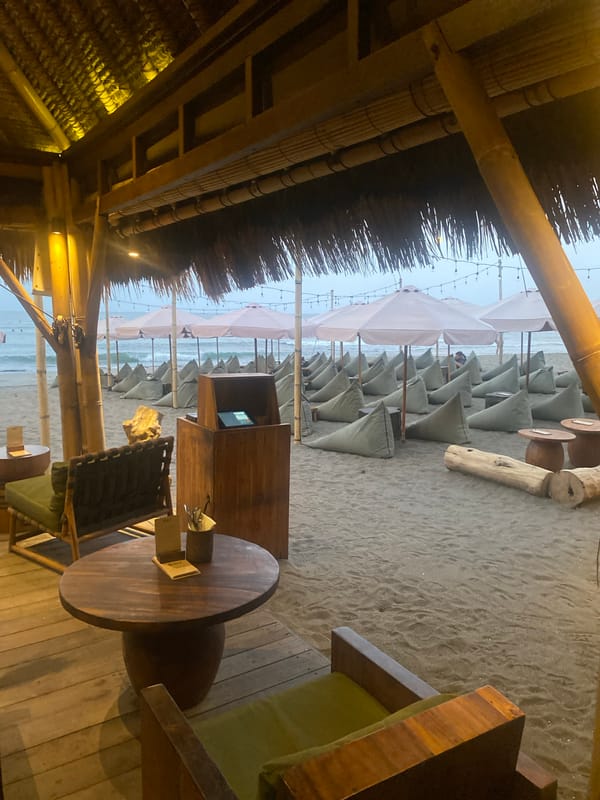 Thatched beachfront café setup in North Kuta, Bali