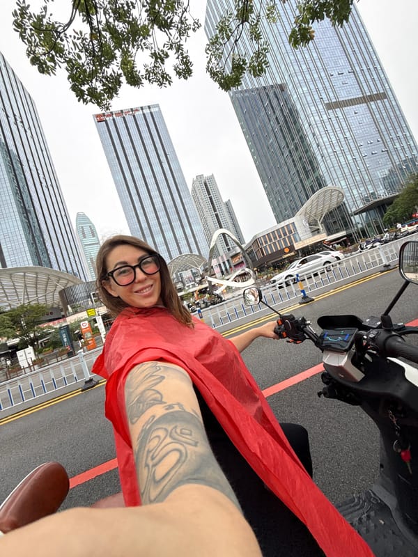 Rainy morning scooter ride through Huizhou's urban core