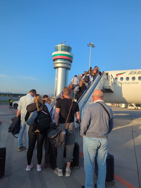 KC-135 tankers and civilian departures at Sofia Airport at dawn
