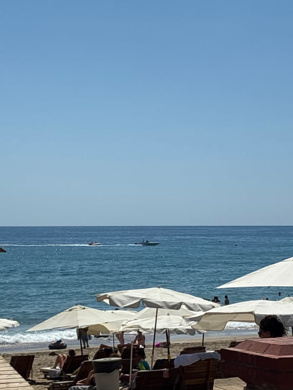 Busy summer afternoon along Alanya's beach and promenade