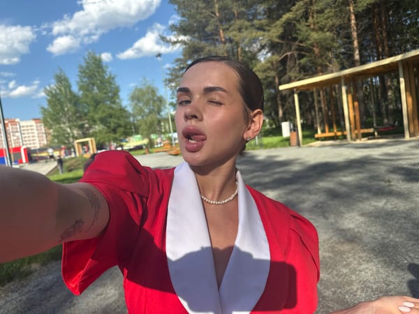 Woman in red blazer photographed multiple times in Perm