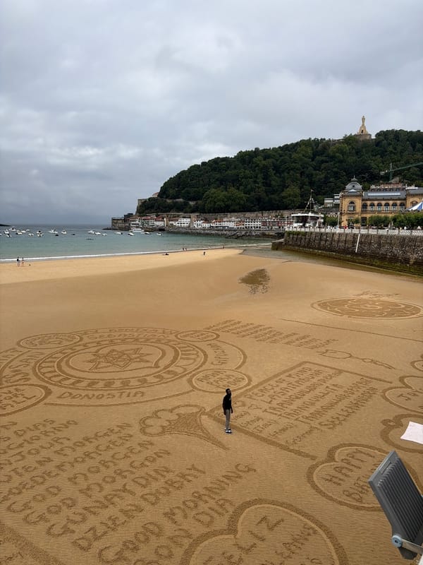 Intricate sand art spreads across La Concha Beach in San Sebastián