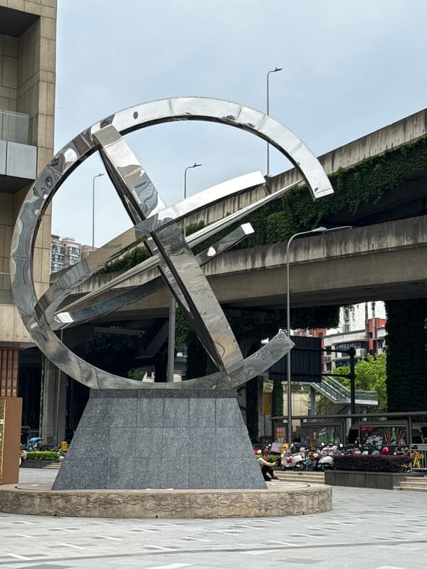 Abstract metal sculpture spotted under elevated road in Chenghua District