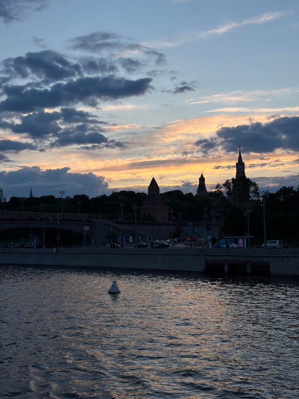 Golden sunset illuminates Moscow river at dusk