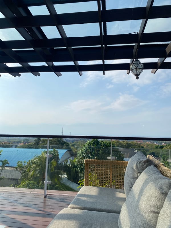 Morning at a Kuta Selatan hotel: rooftops, lobby, and green drinks