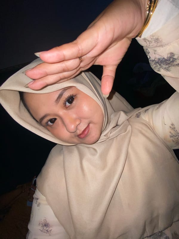 Mother and daughter share quiet morning moments in Indonesian home