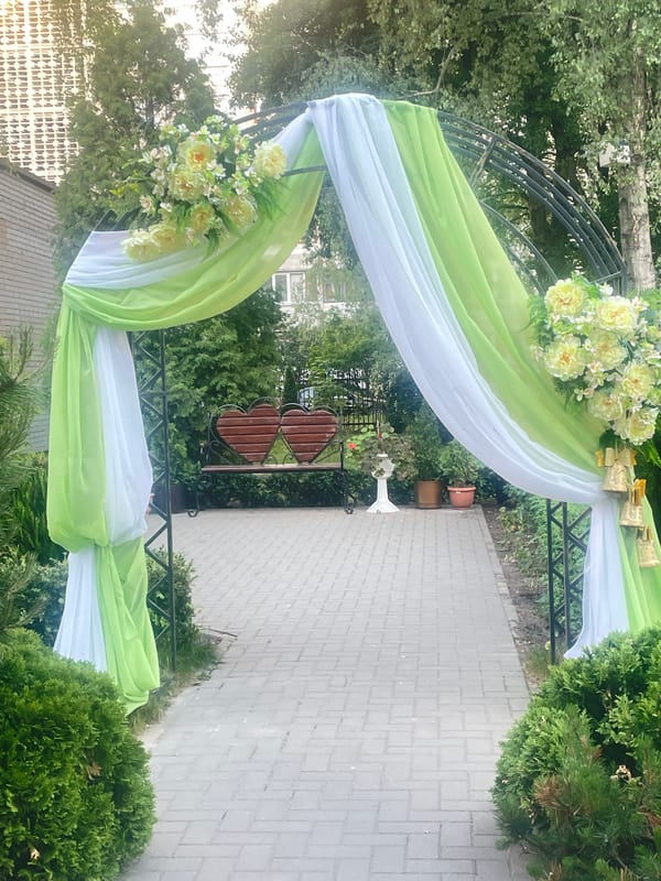 Graduation ceremony with decorative archways held in Brest, Belarus