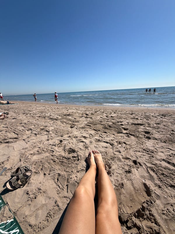 Valencia beach busy with families on sunny morning