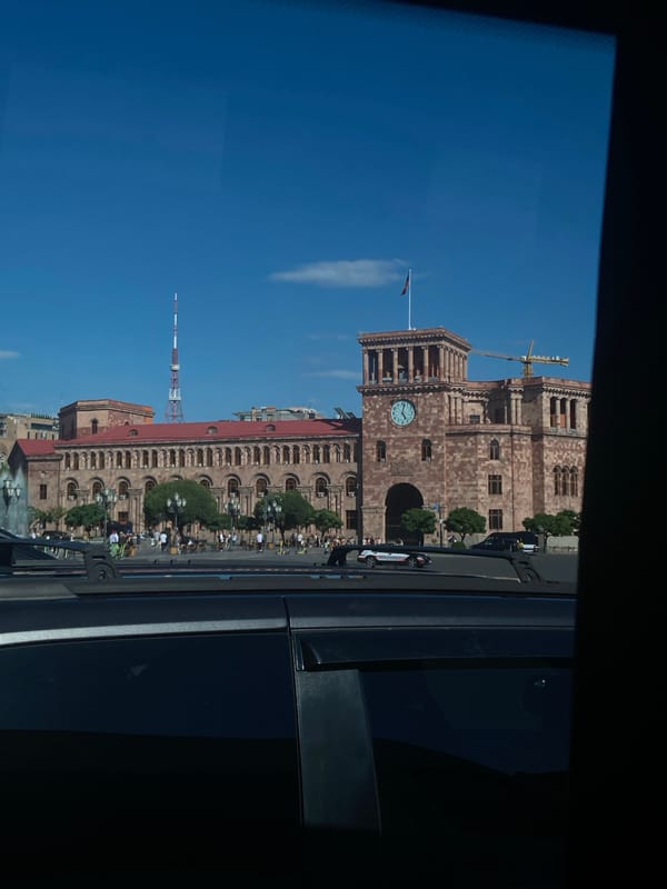 Yerevan afternoon: historic architecture, fountain square, restaurant dining