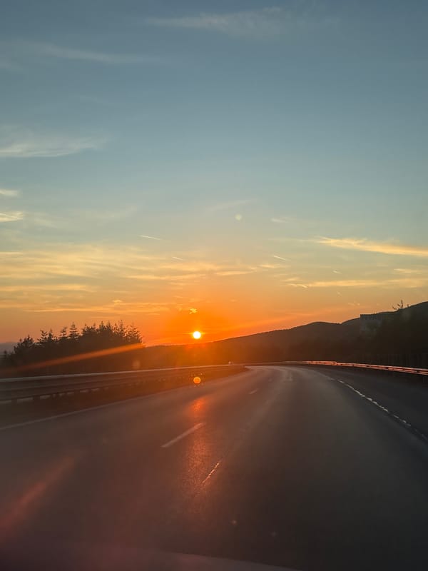 Sunset observed from vehicles near Bulgarian villages