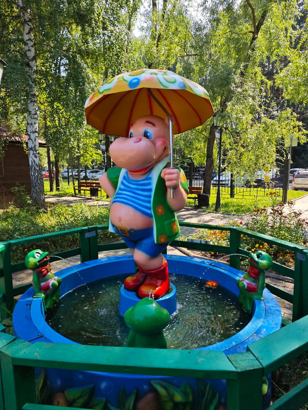 Summer morning in a Chaikovsky park, fountains to duck ponds