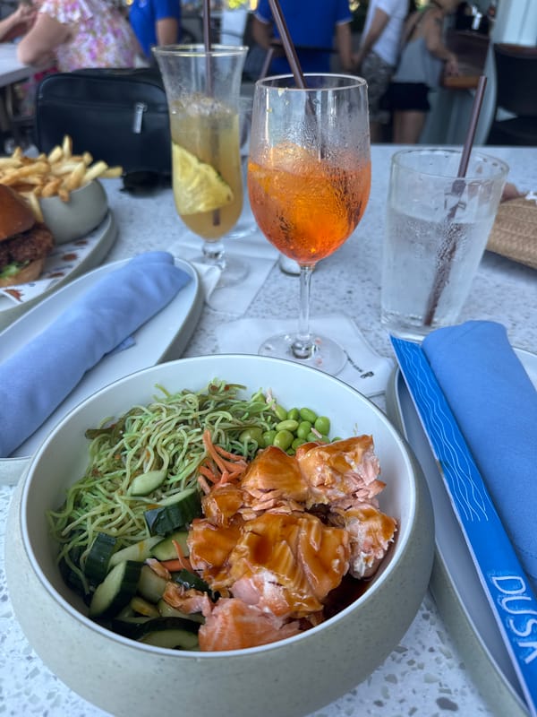 Dining and drinks captured at Pelican Bay beachside locations