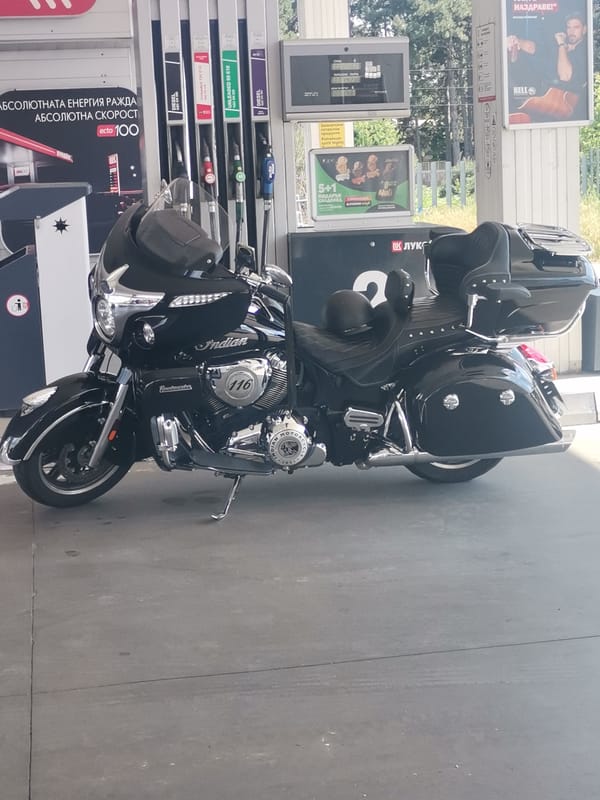 Black Indian Roadmaster parked at a Byala gas station