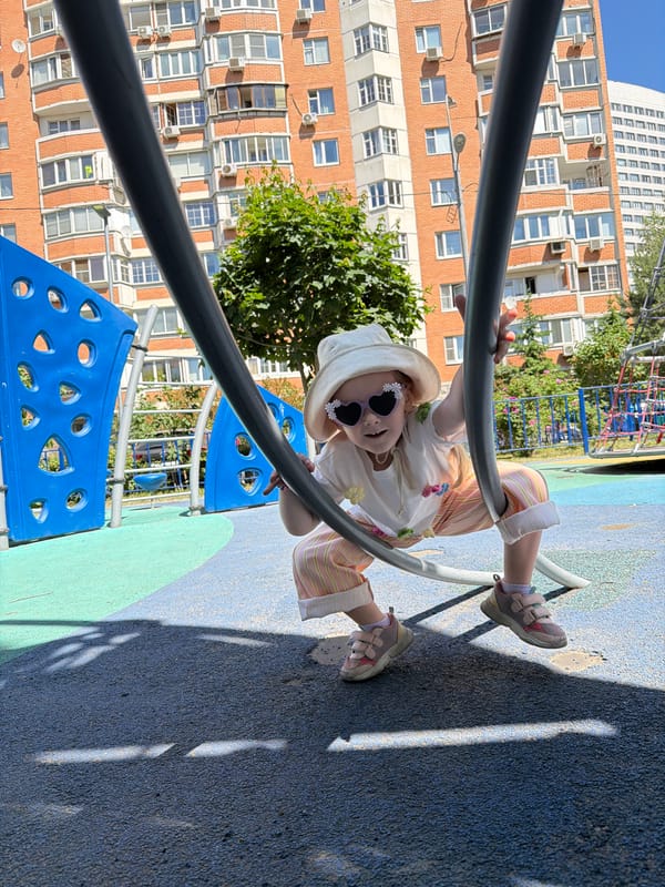 Morning playground visit captured in sunny Moscow