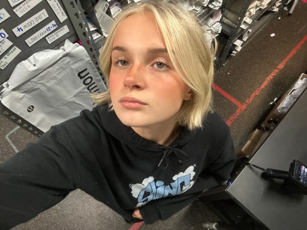 Woman takes selfies in Whistler retail spaces