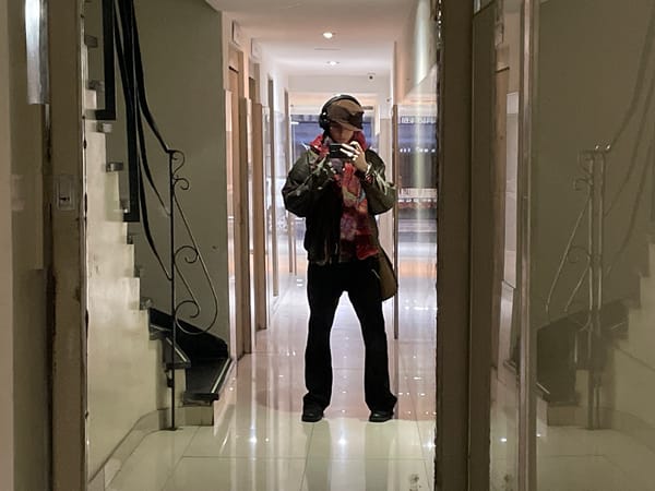 Person documented taking selfies, walking streets in Buenos Aires