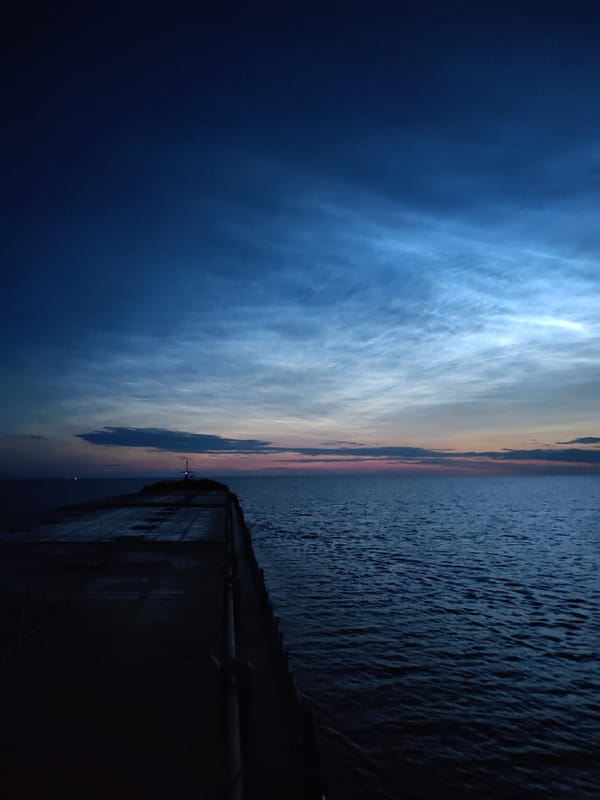 Twilight at the water's edge in Ozernoe Ust'e, Russia