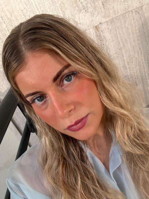 Woman takes selfies in Paris apartment