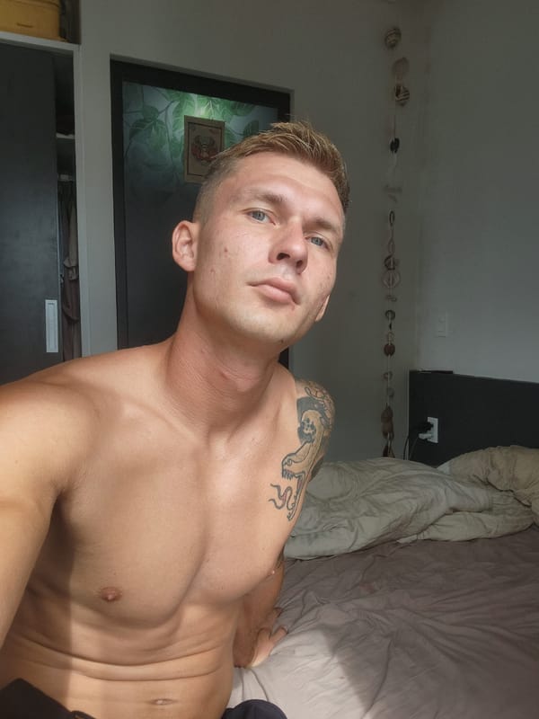 Lazy afternoon indoors with a poodle and a tattooed roommate