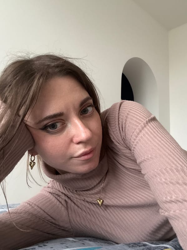Woman in pink observed in Moscow vehicle interior