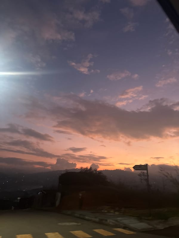 Evening sky gradient observed over Guarne, Colombia mountains