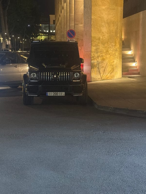 Night scenes captured: vehicles, casino, bar, illuminated tower