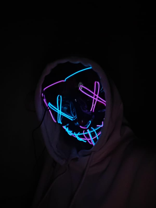 Individual spotted wearing glowing neon mask in Saint Petersburg