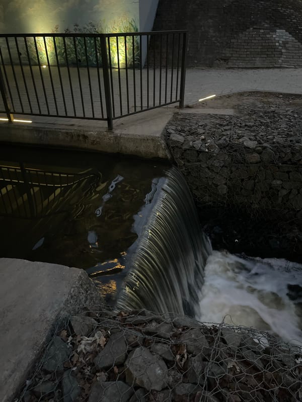 Rapid water flow observed over concrete weir in Chernyakhovsk