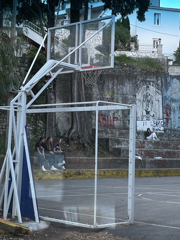 Casual gathering at basketball court in Herceg Novi, Montenegro