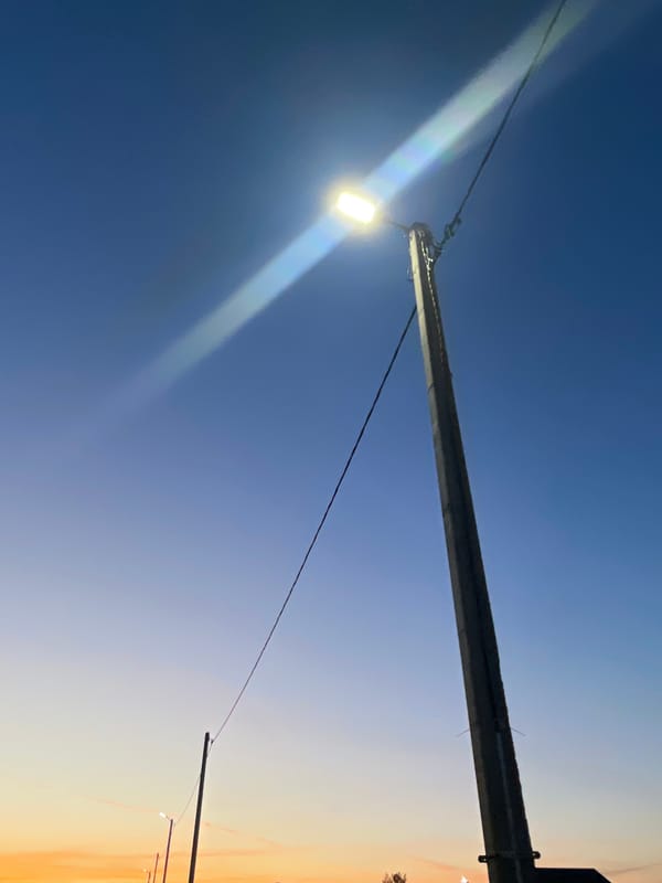 Sunset stroll through a rural Belarusian housing development