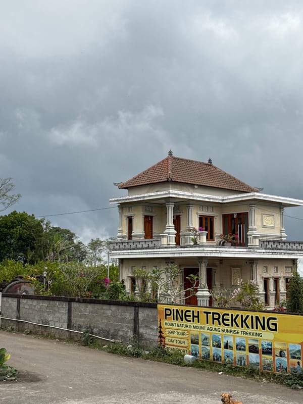 Everyday street life in Kintamani under overcast skies