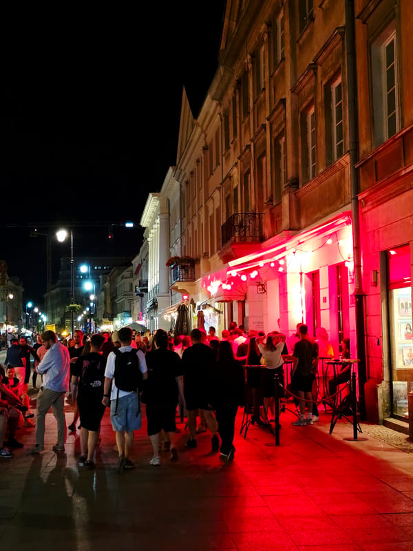 Krakowskie Przedmieście buzzing on a Warsaw summer night