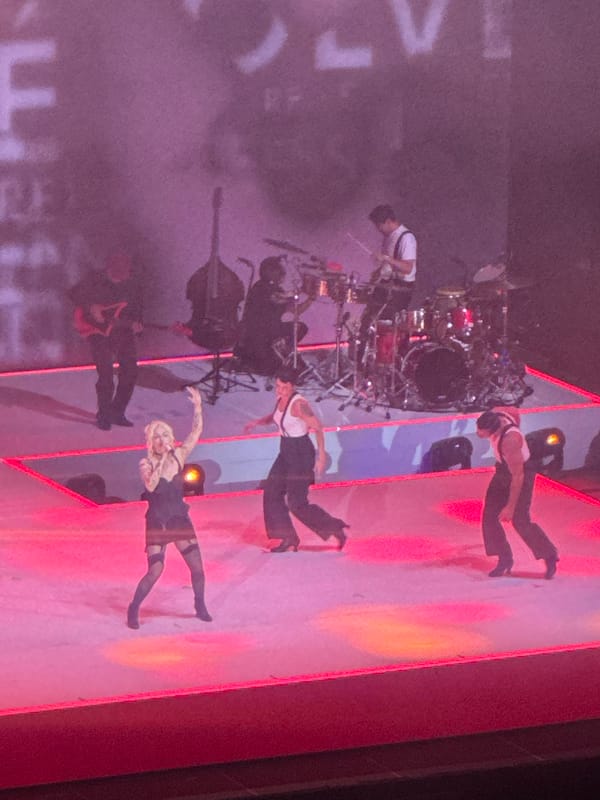 Live music performance features dancers on stage in Puebla