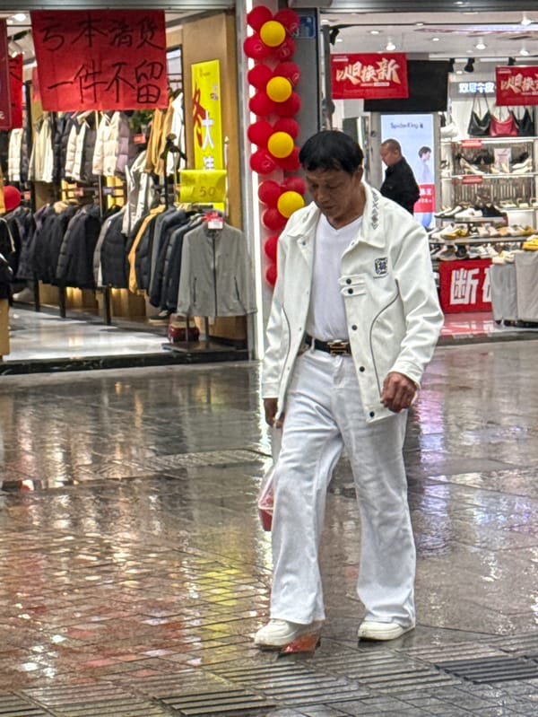 Early morning life continues amid wet streets in Jiangjin