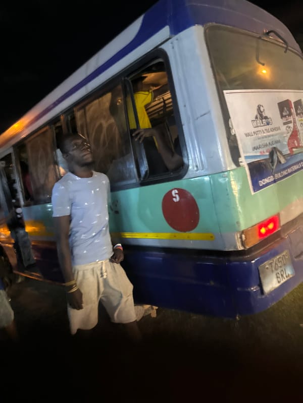 Evening street commerce and bus accident documented in Dar es-Salaam
