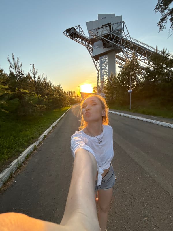 Woman and child photographed on road in Прикамский, Russia