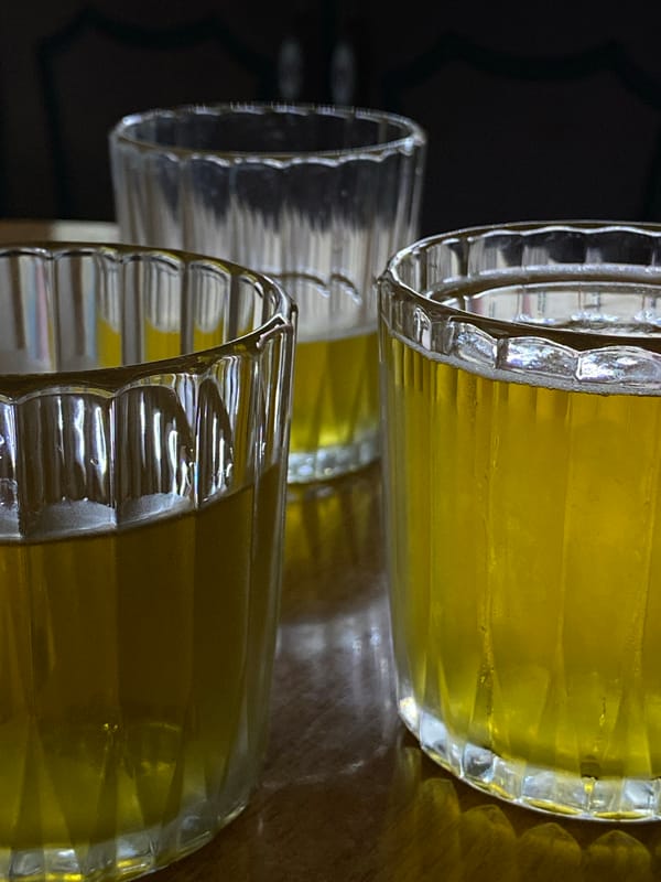 Three glasses arranged on wooden surface in Votkinsk