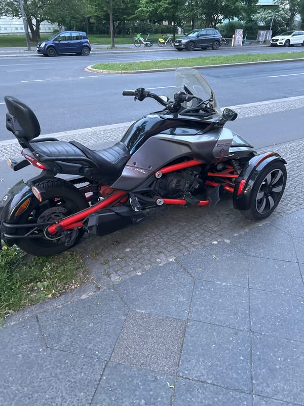 Can-Am Spyder motorcycle parked on Berlin sidewalk