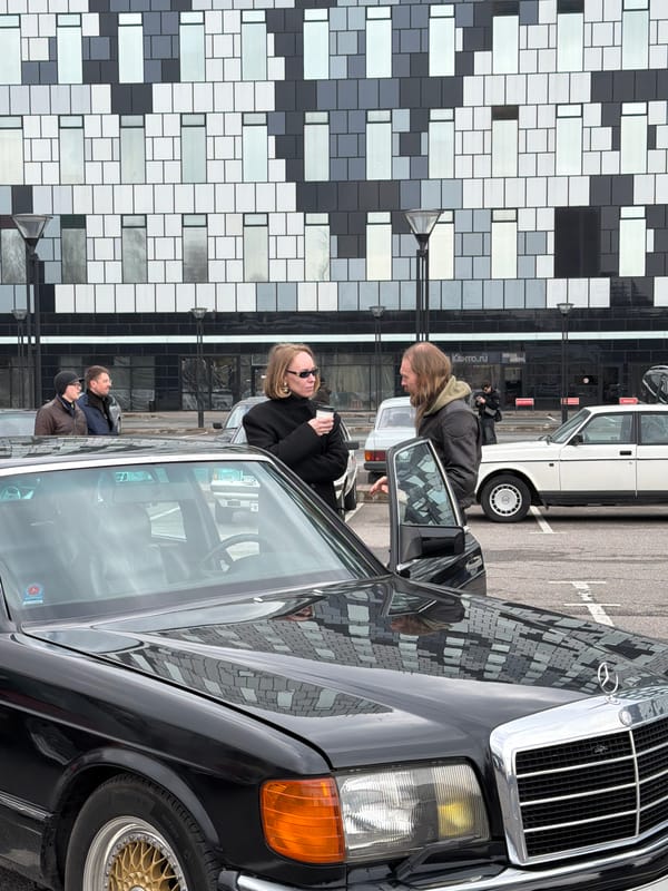Vintage car enthusiasts gather in Saint Petersburg parking lot