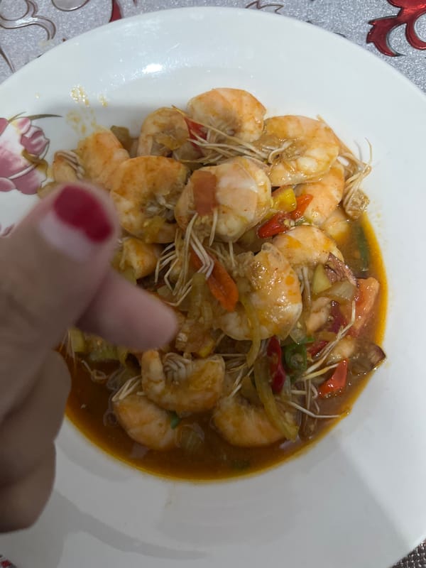 Meal documented in Lampeudaya featuring shrimp and meat dishes