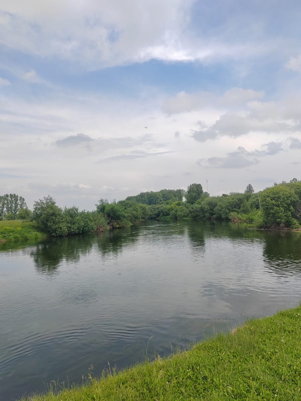 Rural countryside exploration with river views and village life