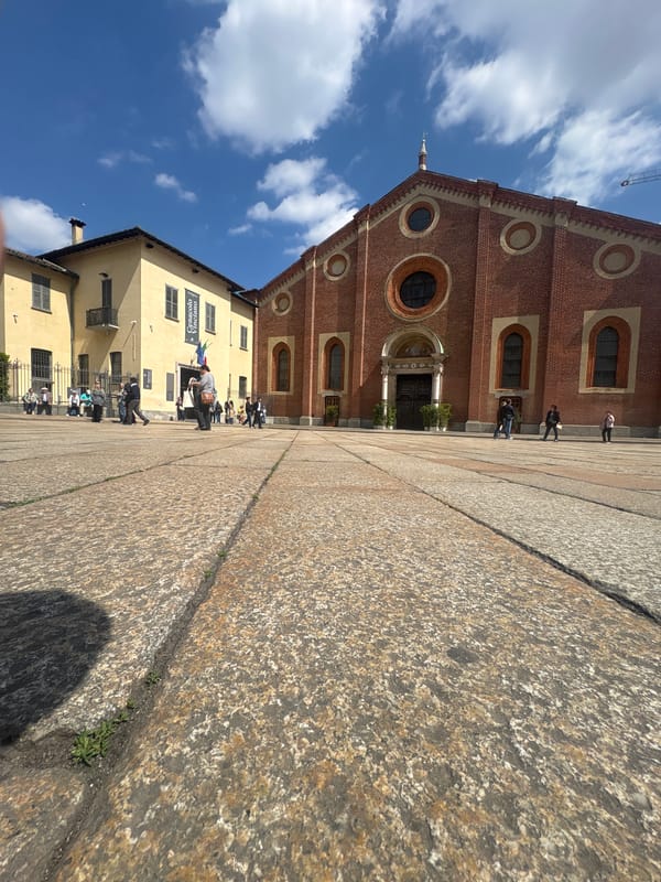Tourists gather at Milan's Santa Maria delle Grazie church