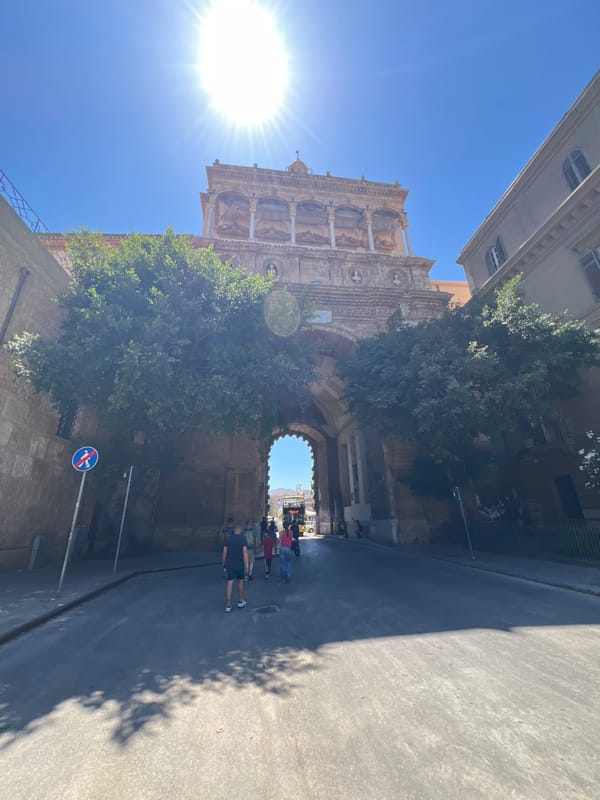 Midday Palermo: historic arches, street art, and pastry shops