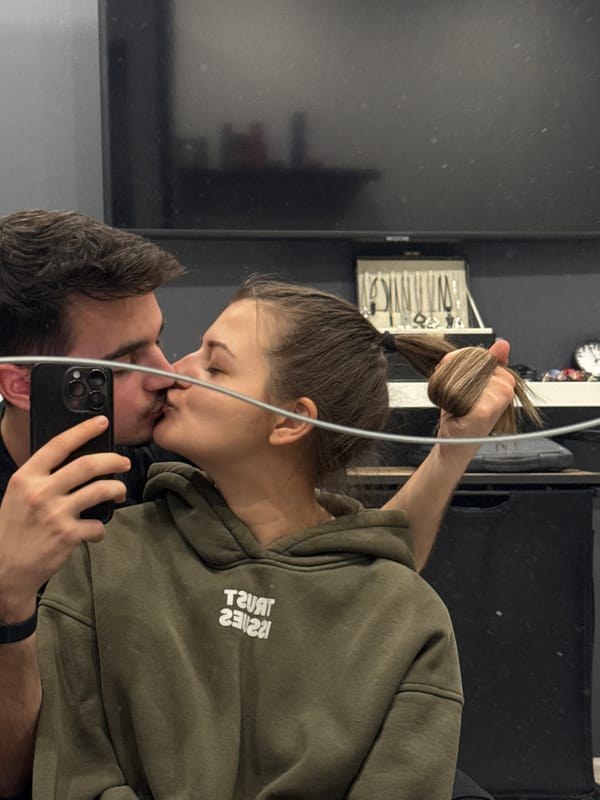 Couple takes mirror selfies in Sofia