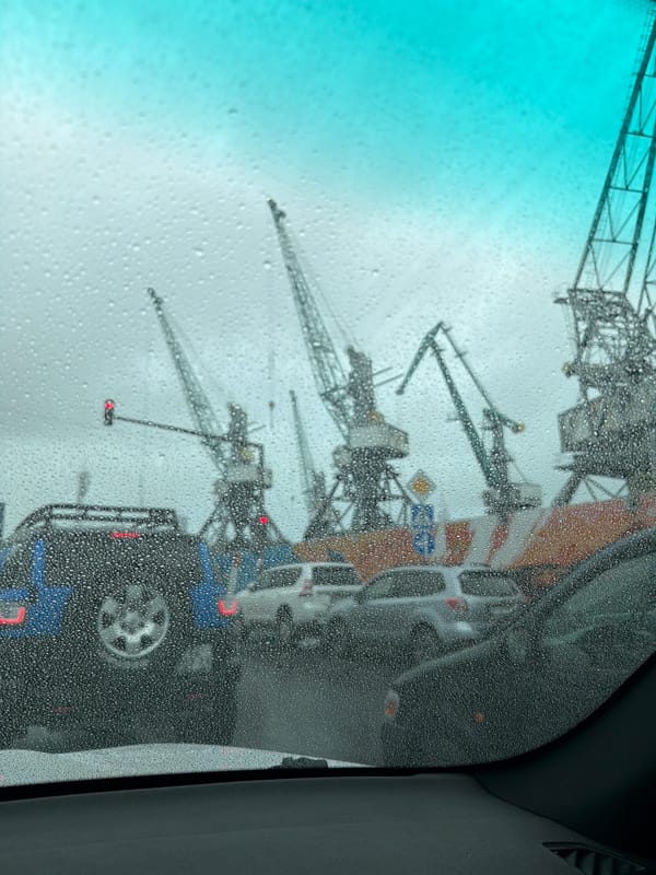 Rainy day car wash scene documented in Batumi, Georgia