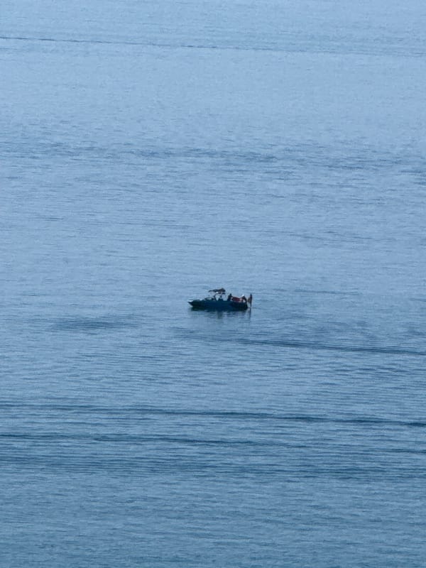 Boats and coastal life along the Boreti, Montenegro shoreline