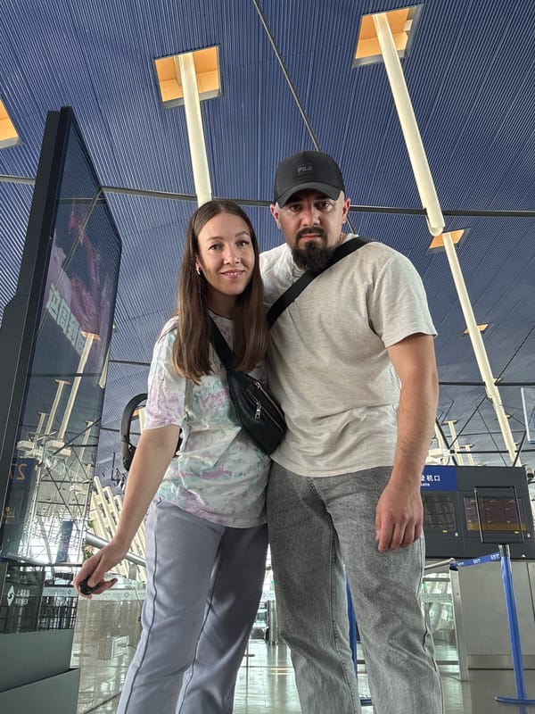 Couple photographs at Shanghai Pudong Airport early morning