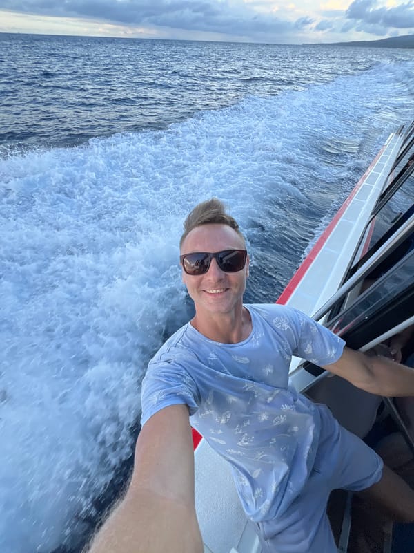 Tourist documents boat journey near Nusa Penida with selfies