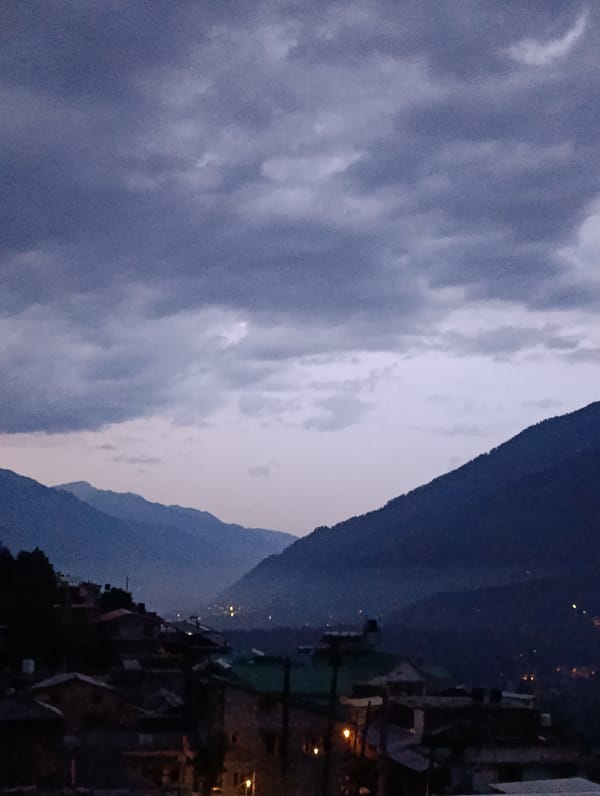 Dusk to night over Vashisht, stormy skies and valley lights